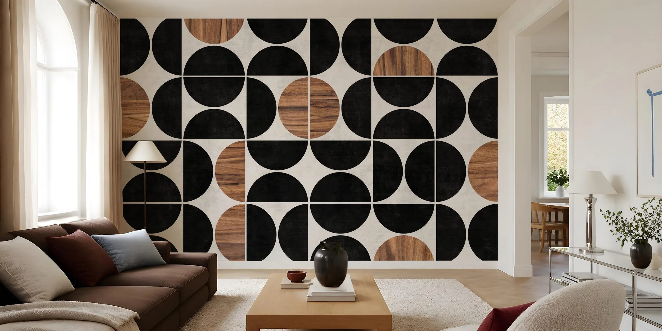 A contemporary living room with a carefully patterned geometric wallpaper feature wall